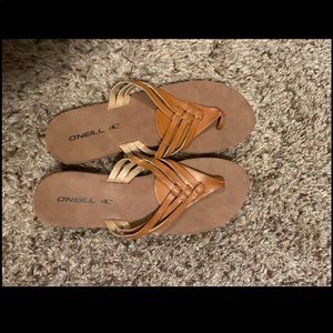 O’Neil flip flops. Never worn. Size 9